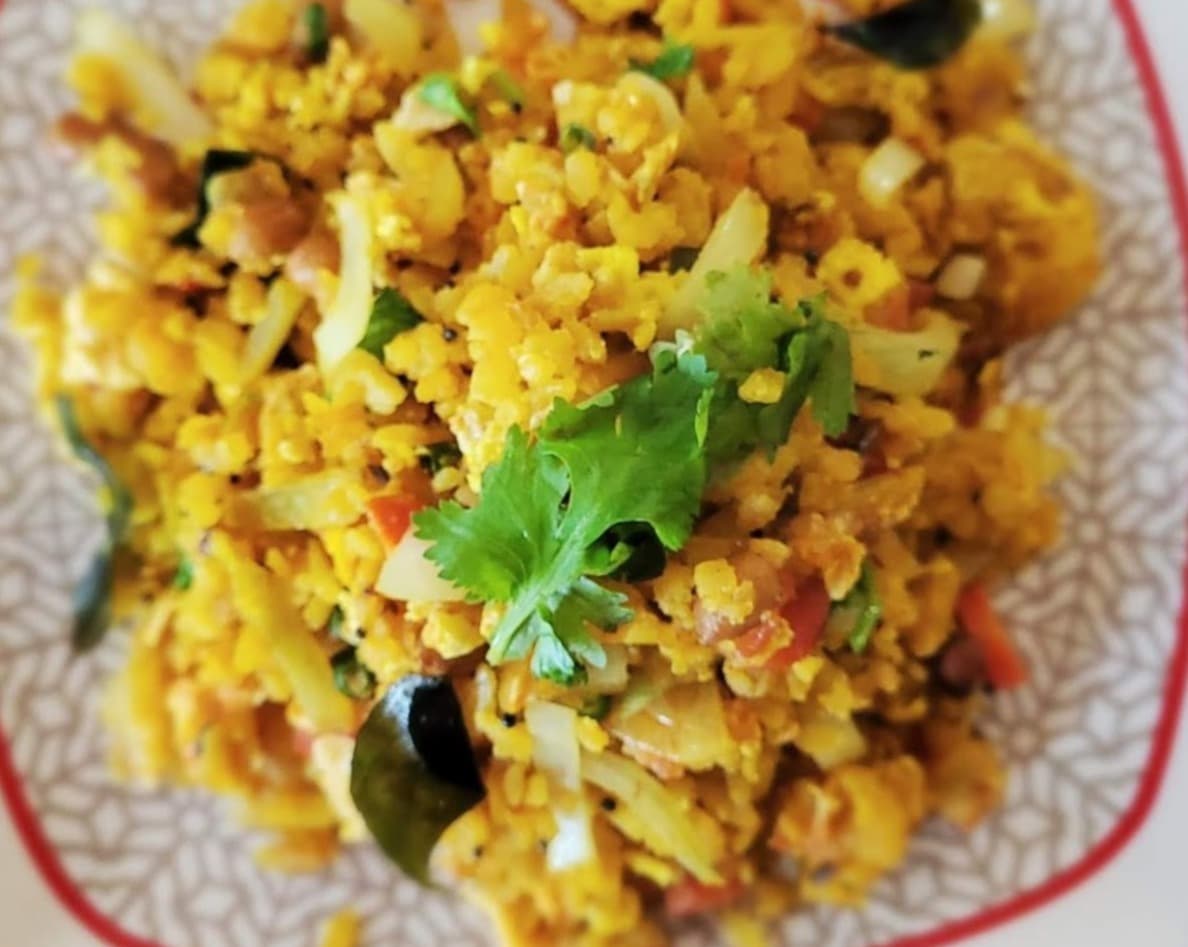 Authentic Anda Poha: Delicious Indian Snack Made with Flattened Rice and Egg