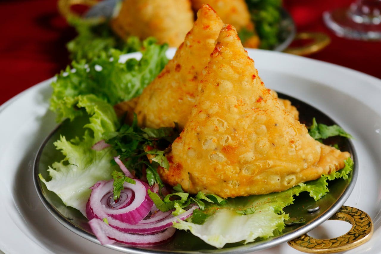 Try the famous Authentic Indian Samosa Recipe: A Crispy and Flavorful Delight featured in Dalmaa Authentic Indian Samosa Recipe: A Crispy and Flavorful Delight